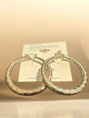 Diva Shimmering Gold Hammered Hoop Earrings
373
